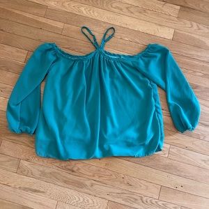 Beautiful off the shoulder top with straps at neck.
